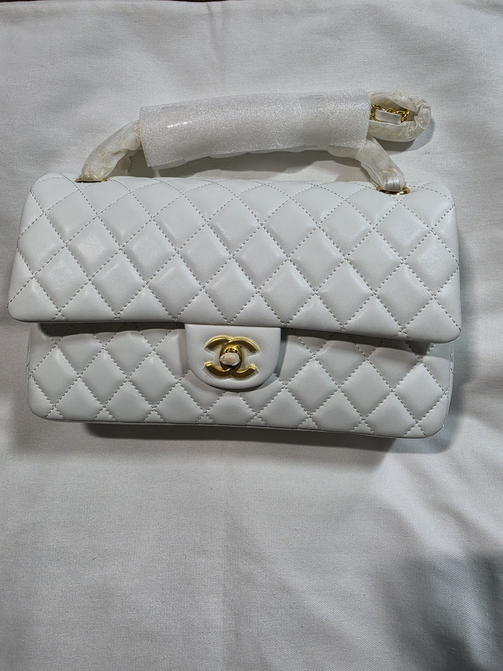 White Quilted Leather Shoulder Bag with Gold Turnlock